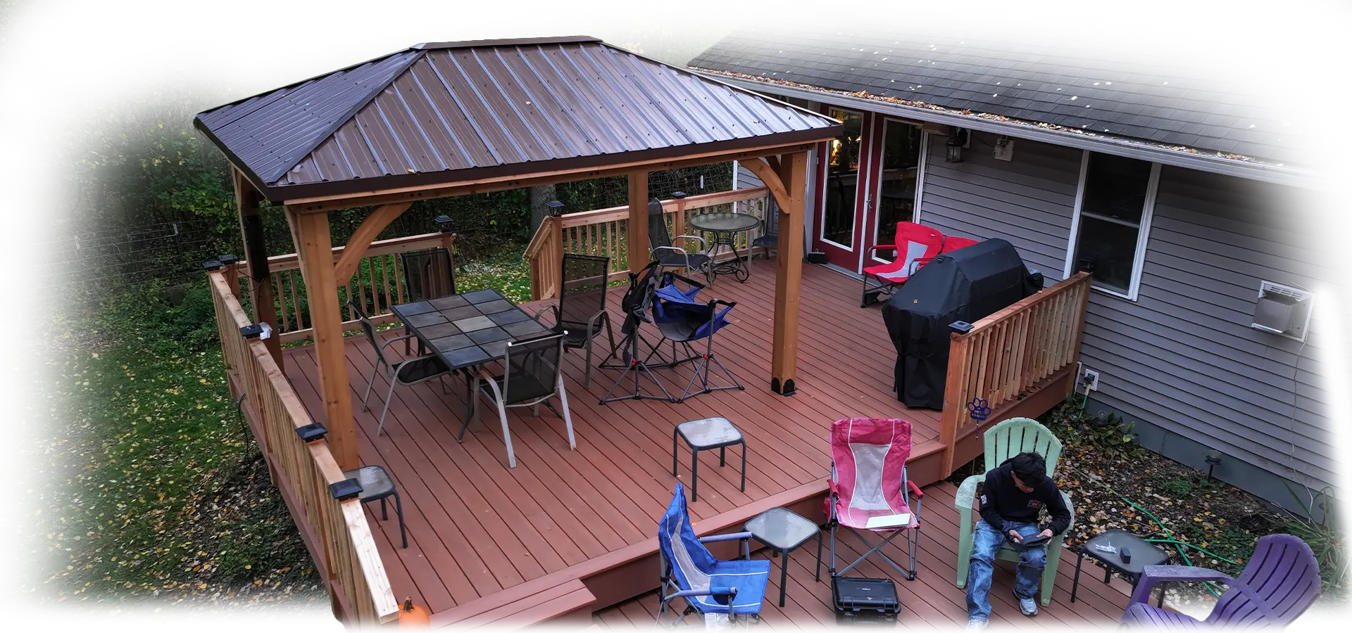 3 Brothers Construction covered deck patio with a metal gazebo roof