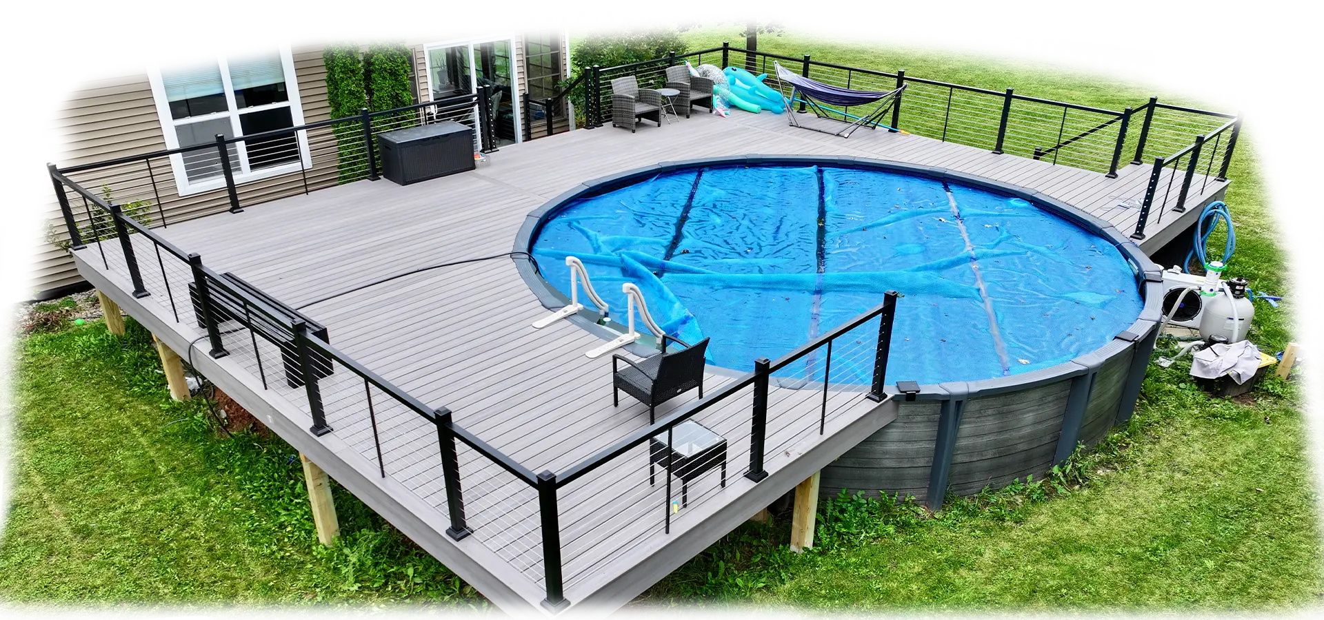3 Brothers Construction deck built around an above-ground pool