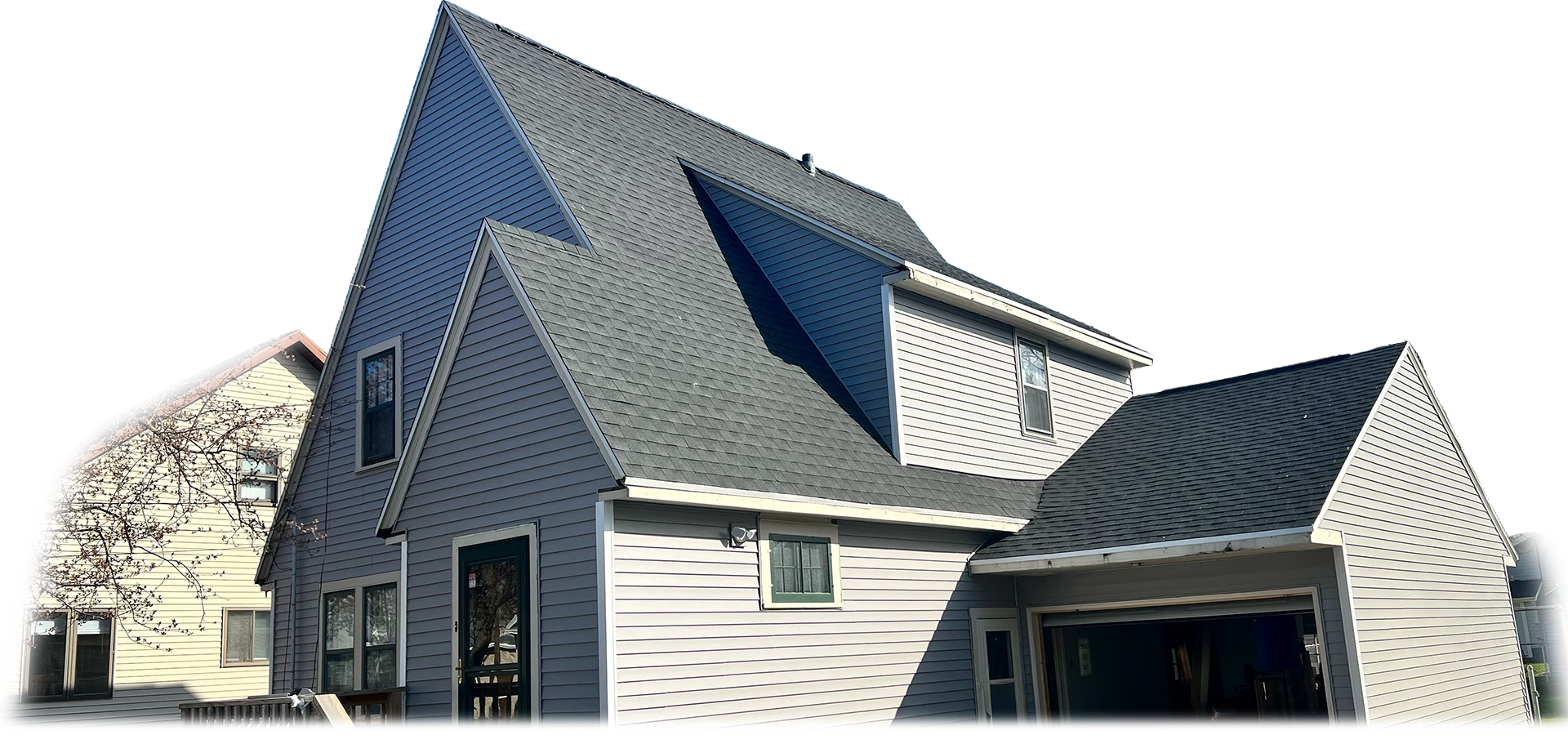Two-story Wisconsin home with a new roof and siding installed by 3 Brothers Construction