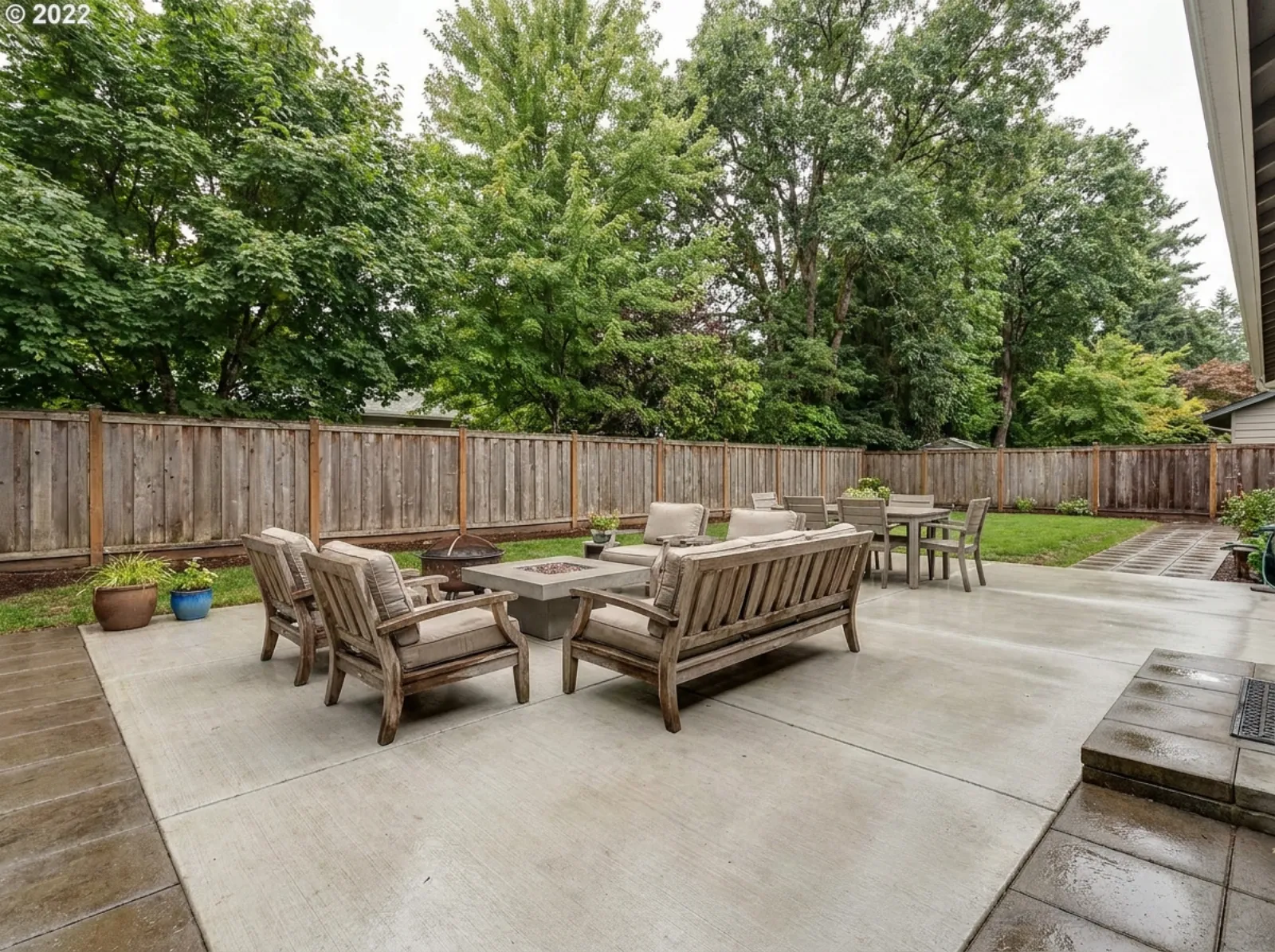 Concrete backyard patio poured by 3 Brothers Construction