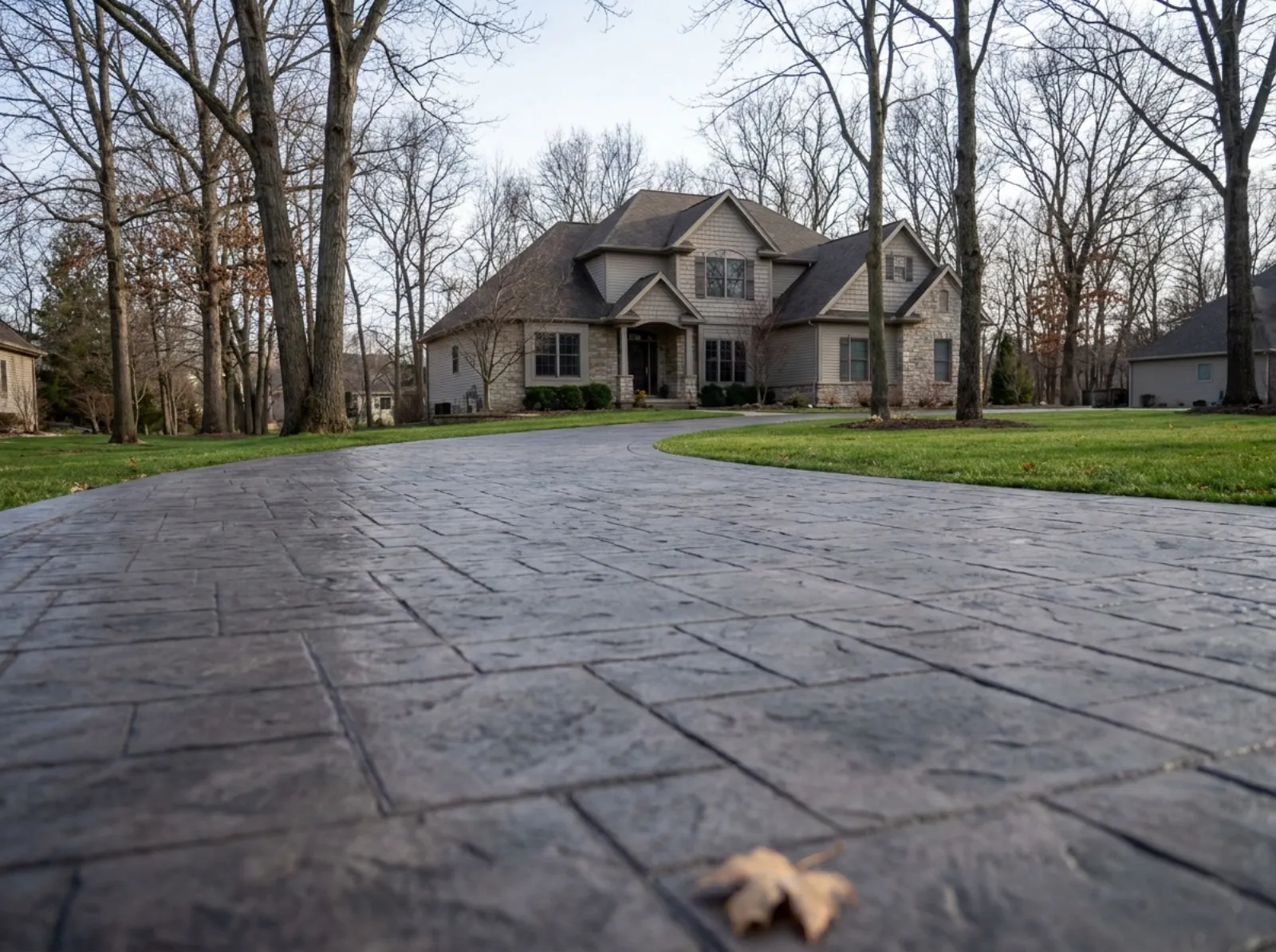 Stamped concrete driveway poured by 3 Brothers Construction