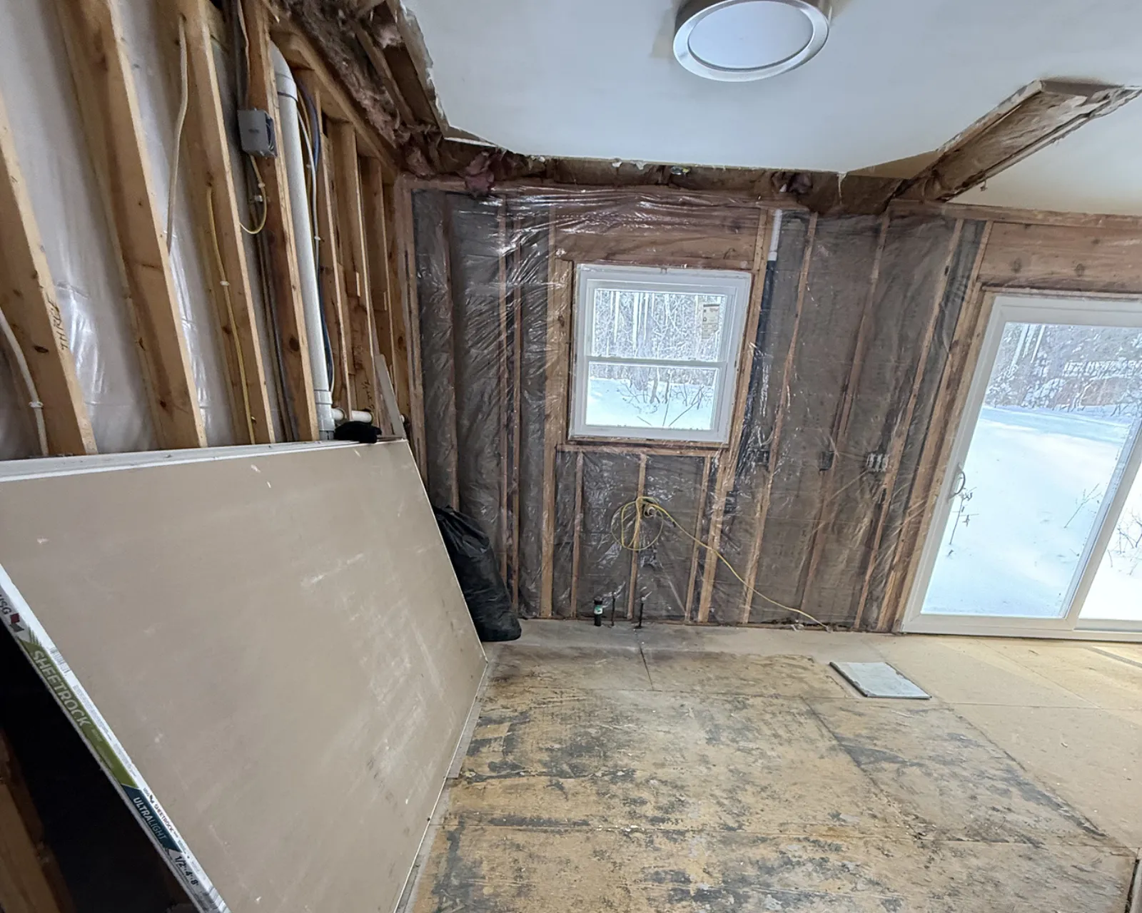 Before: damaged or unfinished drywall before repair