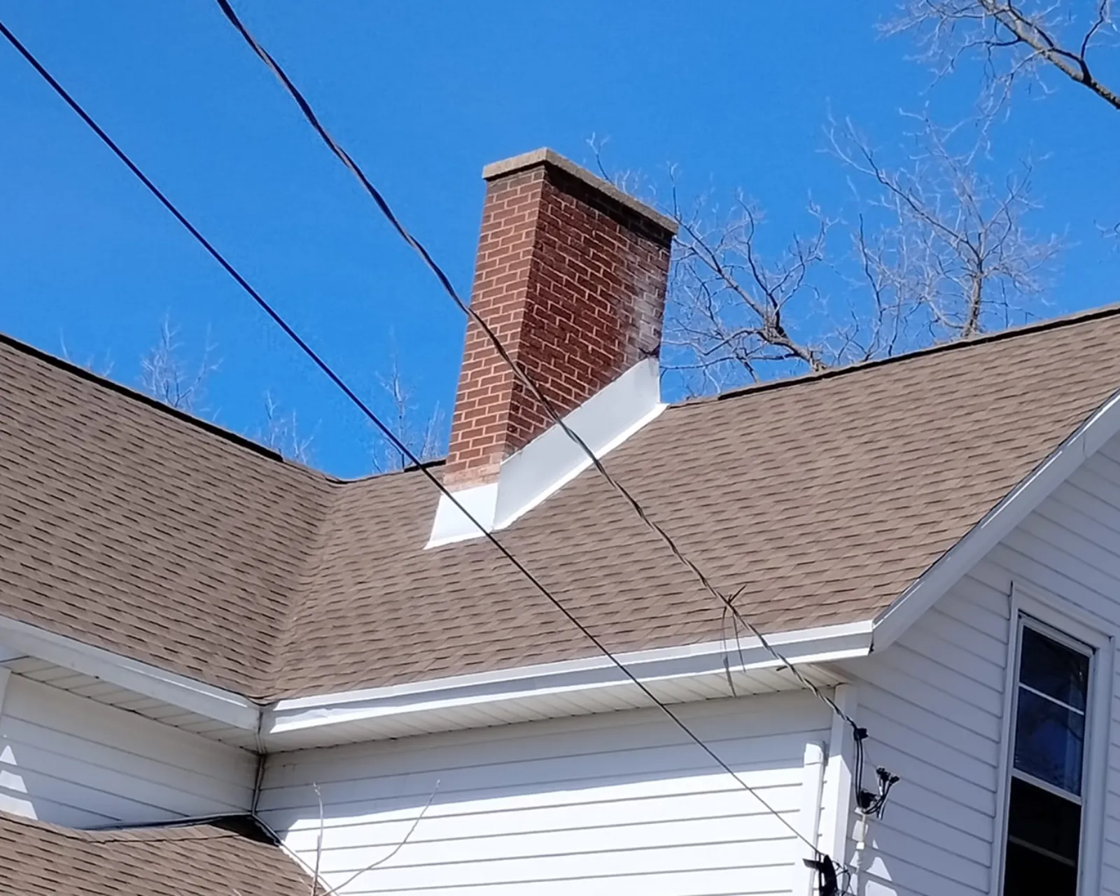 After: new architectural shingle roof installed by 3 Brothers Construction