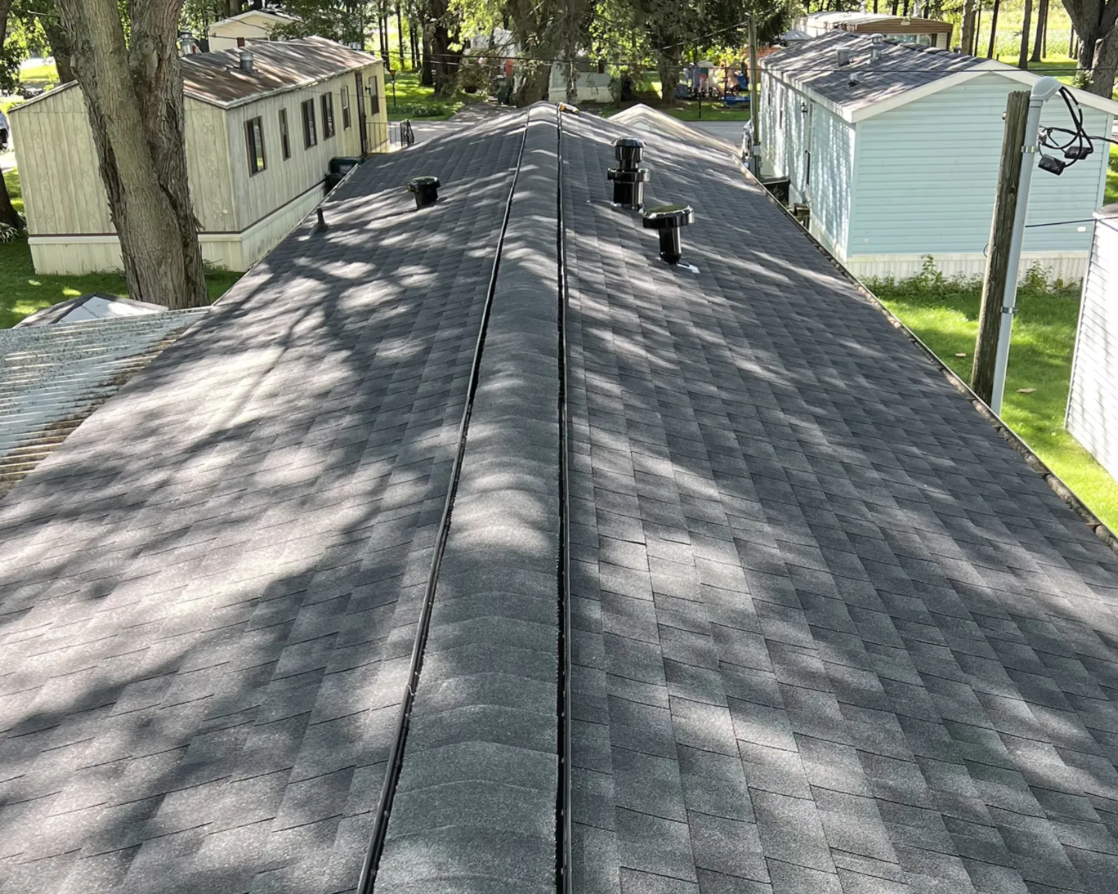 After: new architectural shingle roof installed by 3 Brothers Construction
