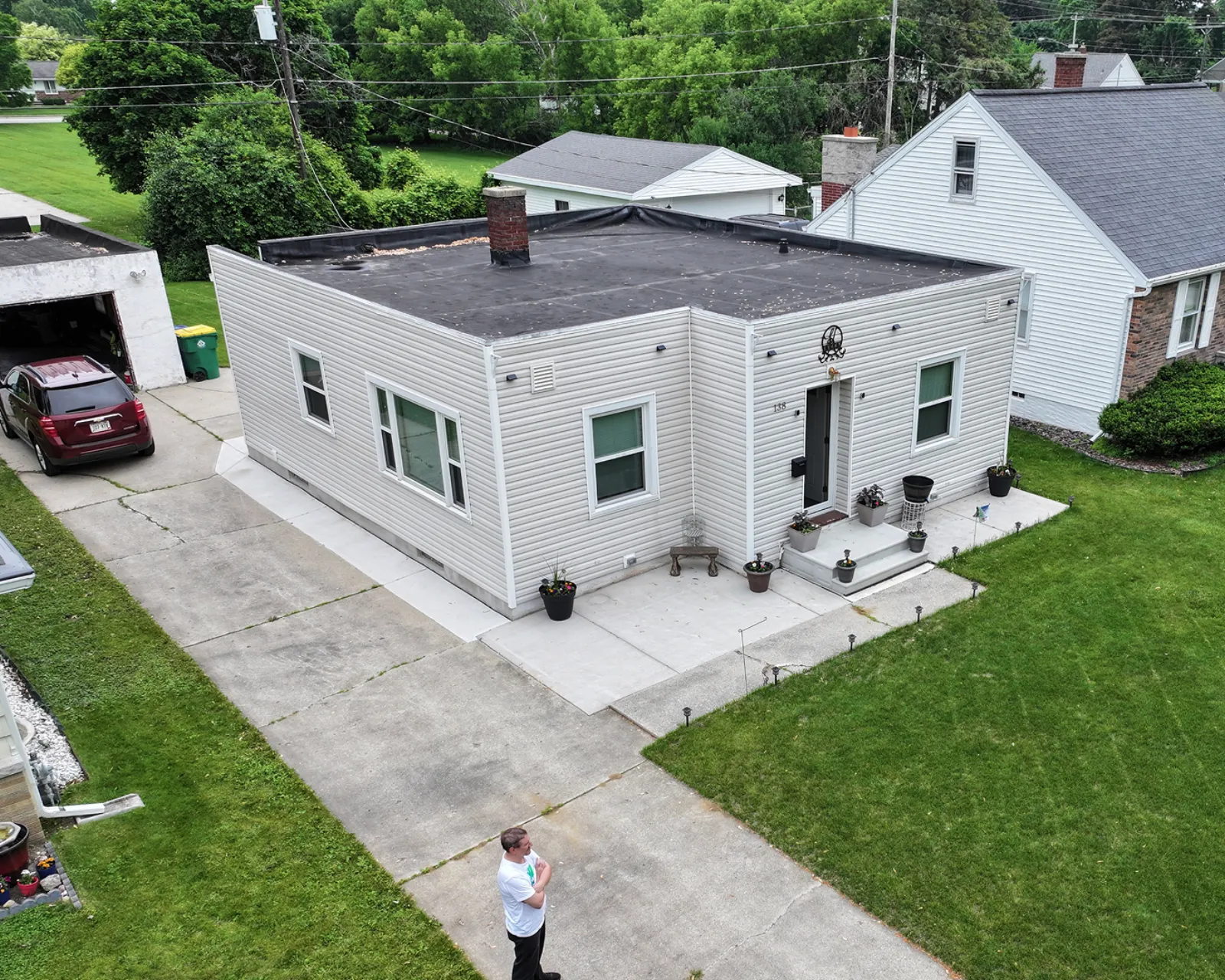 Before: worn shingle roof before replacement