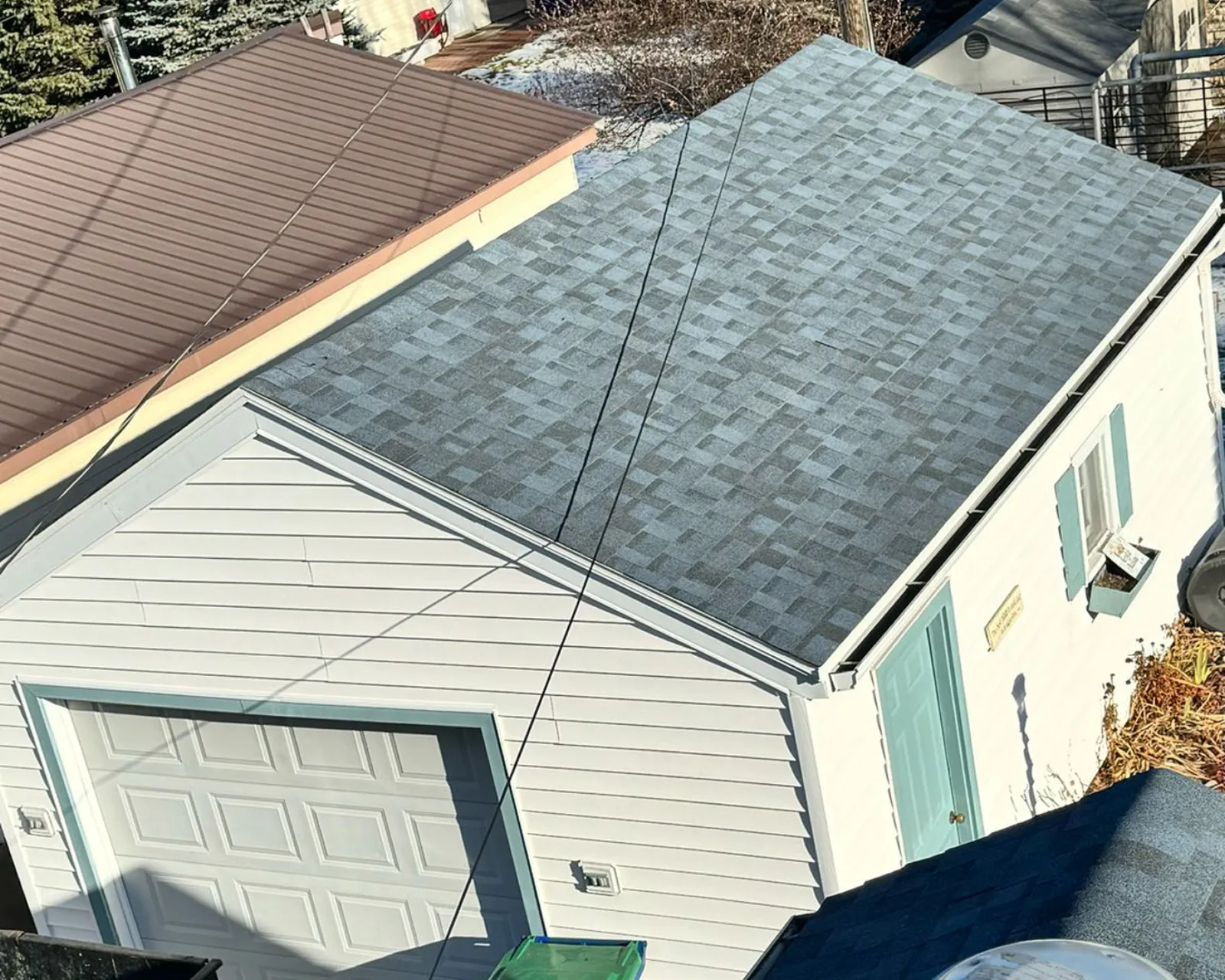 After: new architectural shingle roof installed by 3 Brothers Construction