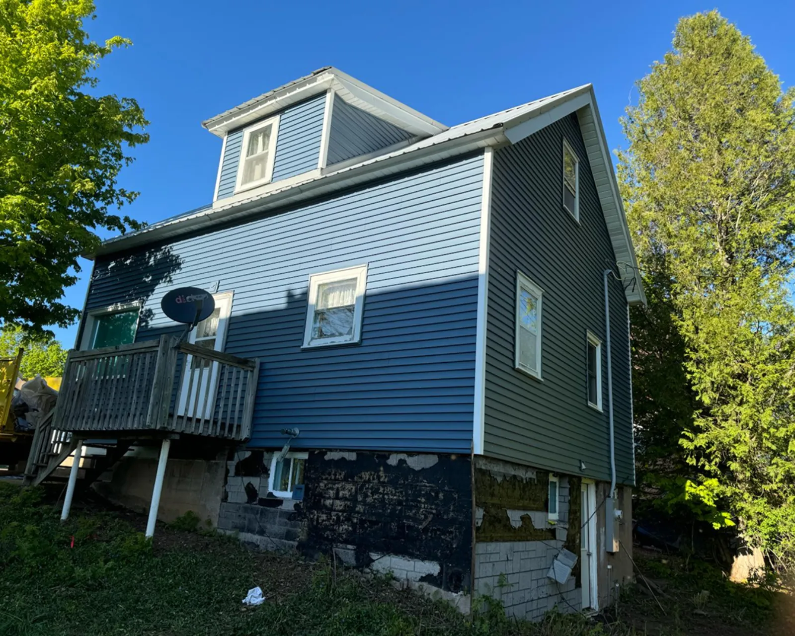 After: new siding installed by 3 Brothers Construction