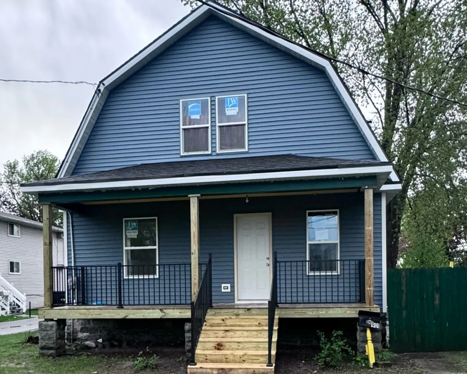 After: new siding installed by 3 Brothers Construction