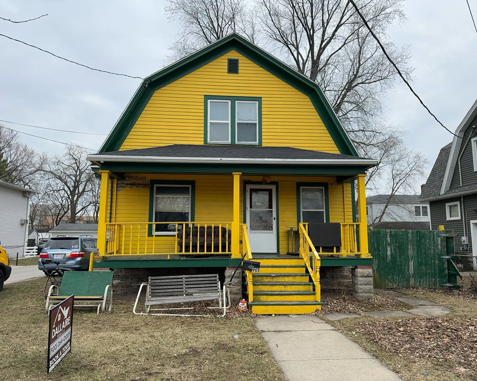 Before: worn or damaged siding before replacement